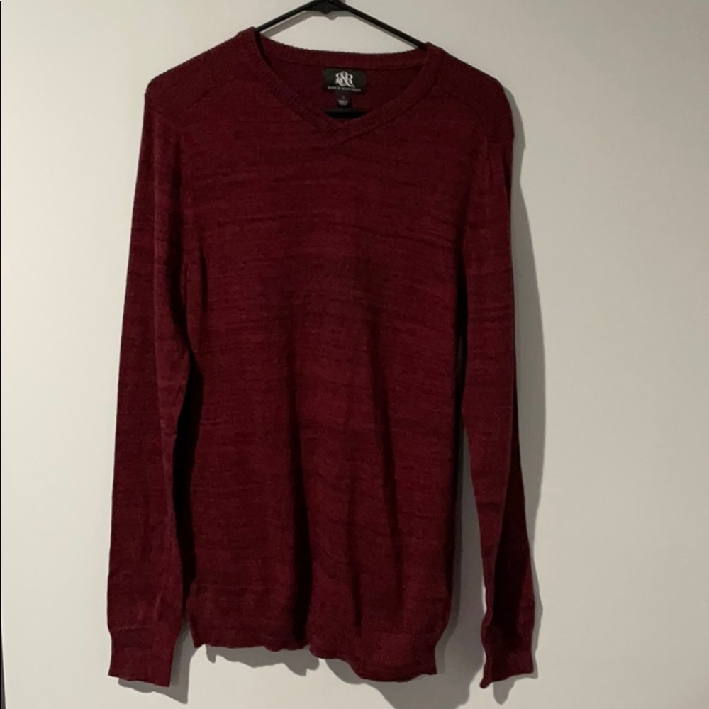 Men’s v-neck sweater. Red with black heathering.